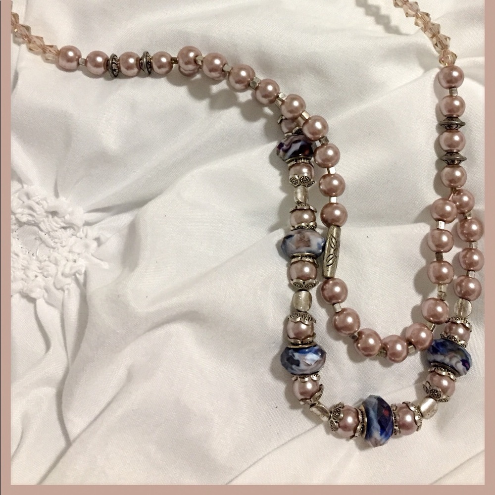 Double strand necklace.  Faux pearls, beads